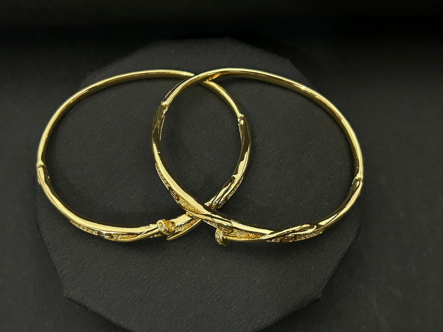 Elegant Crossover Gold Bangles