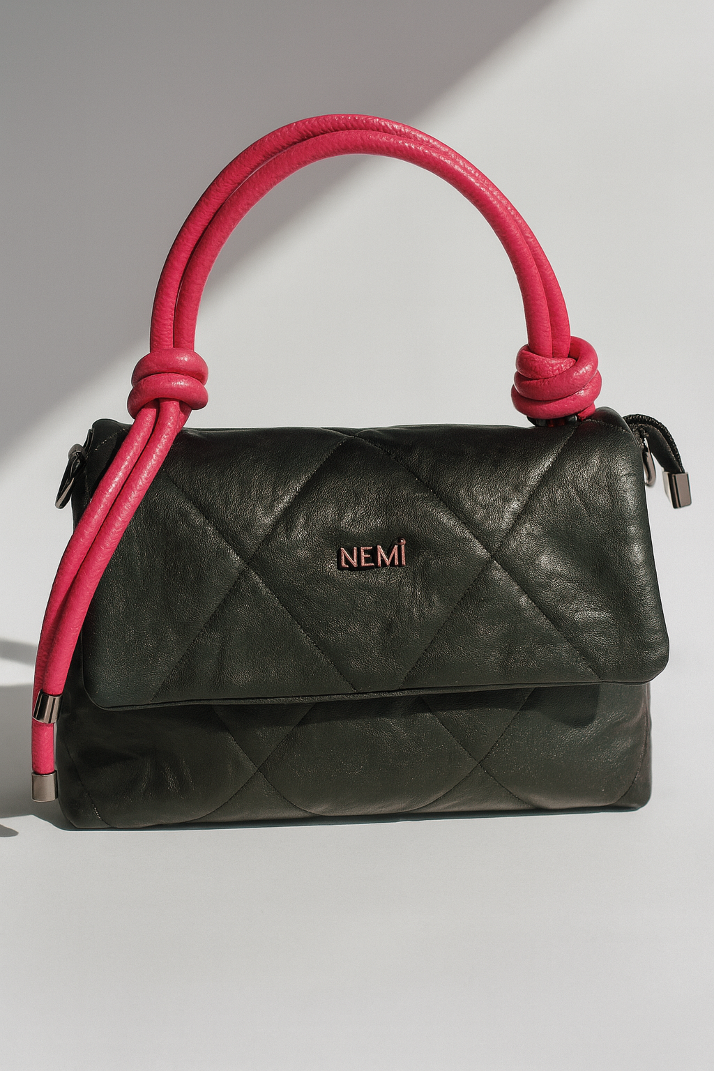 Black Quilted Handbag with Pink Handles