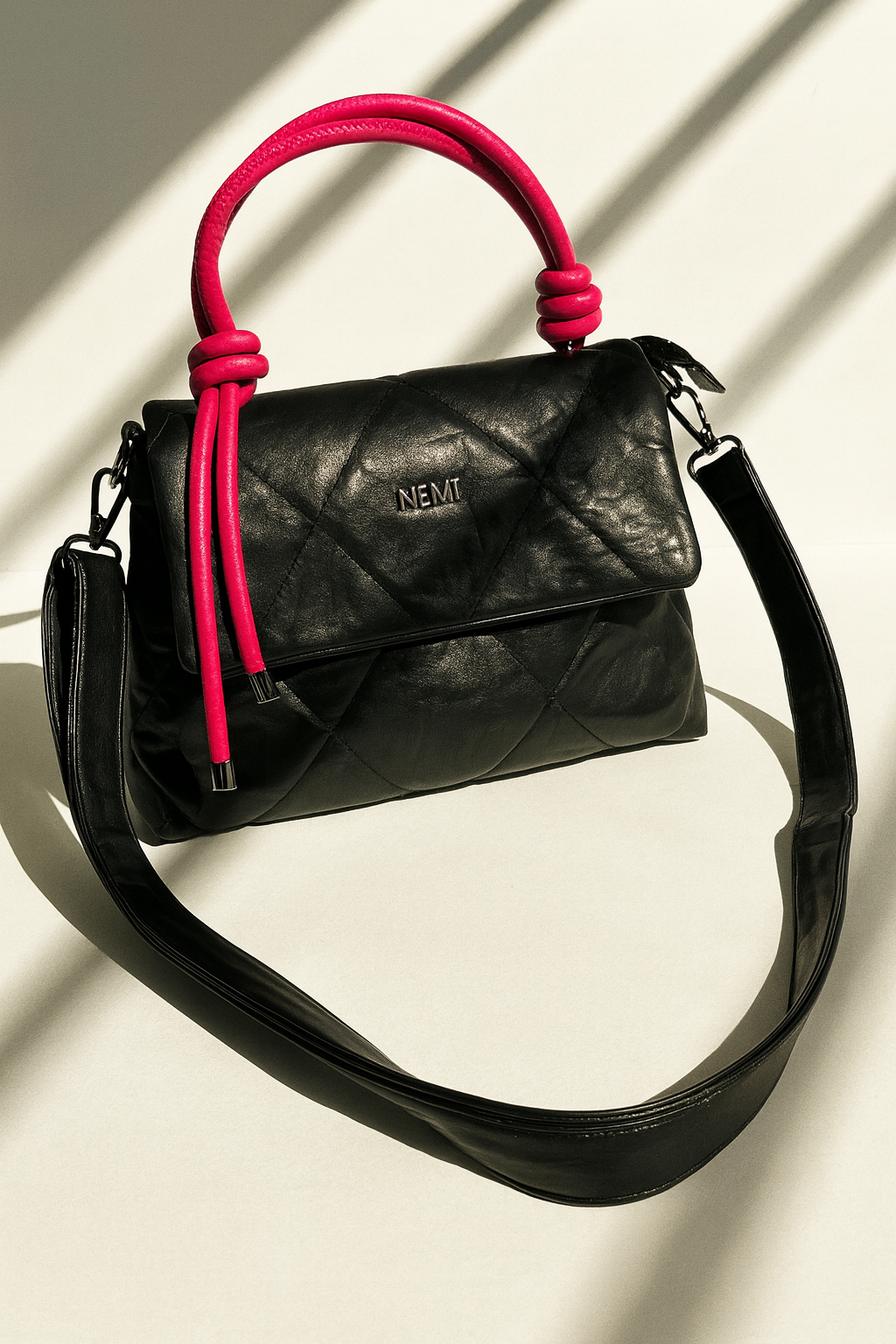 Black Quilted Handbag with Pink Handles