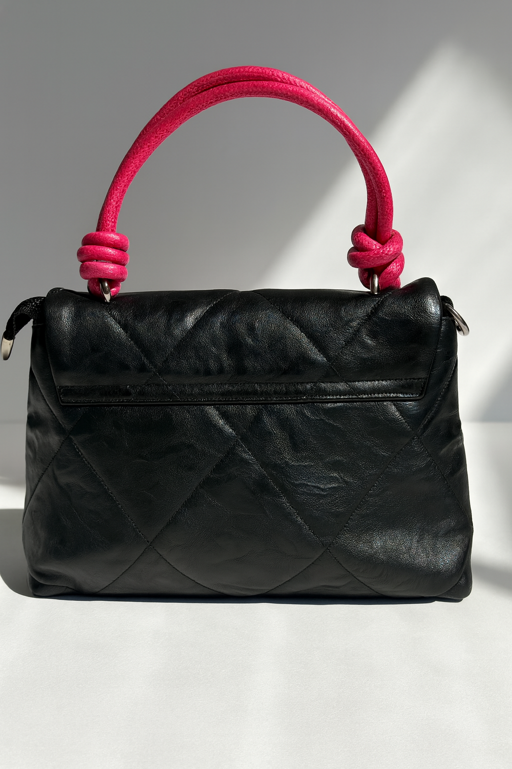 Black Quilted Handbag with Pink Handles
