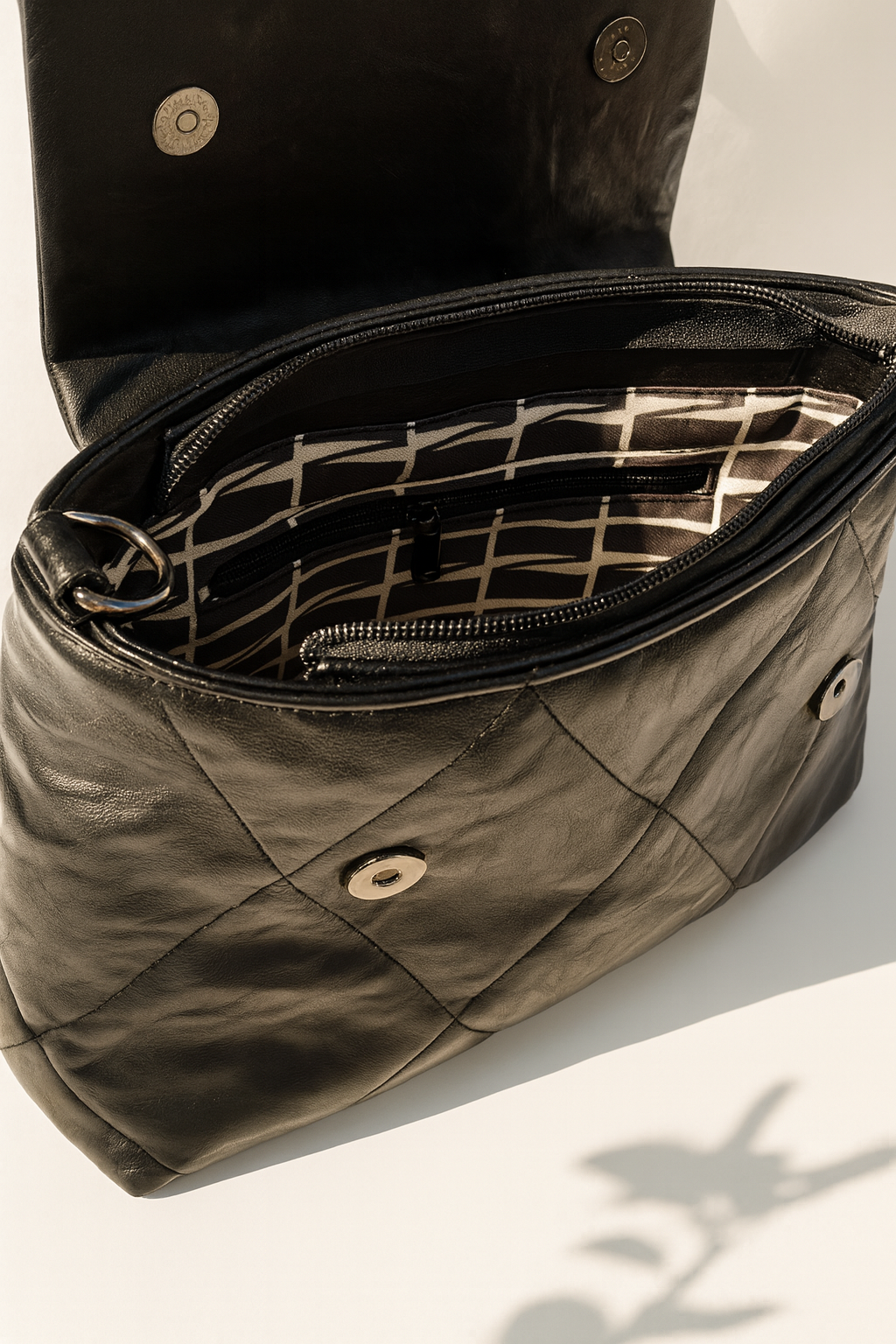 Black Quilted Handbag with Pink Handles