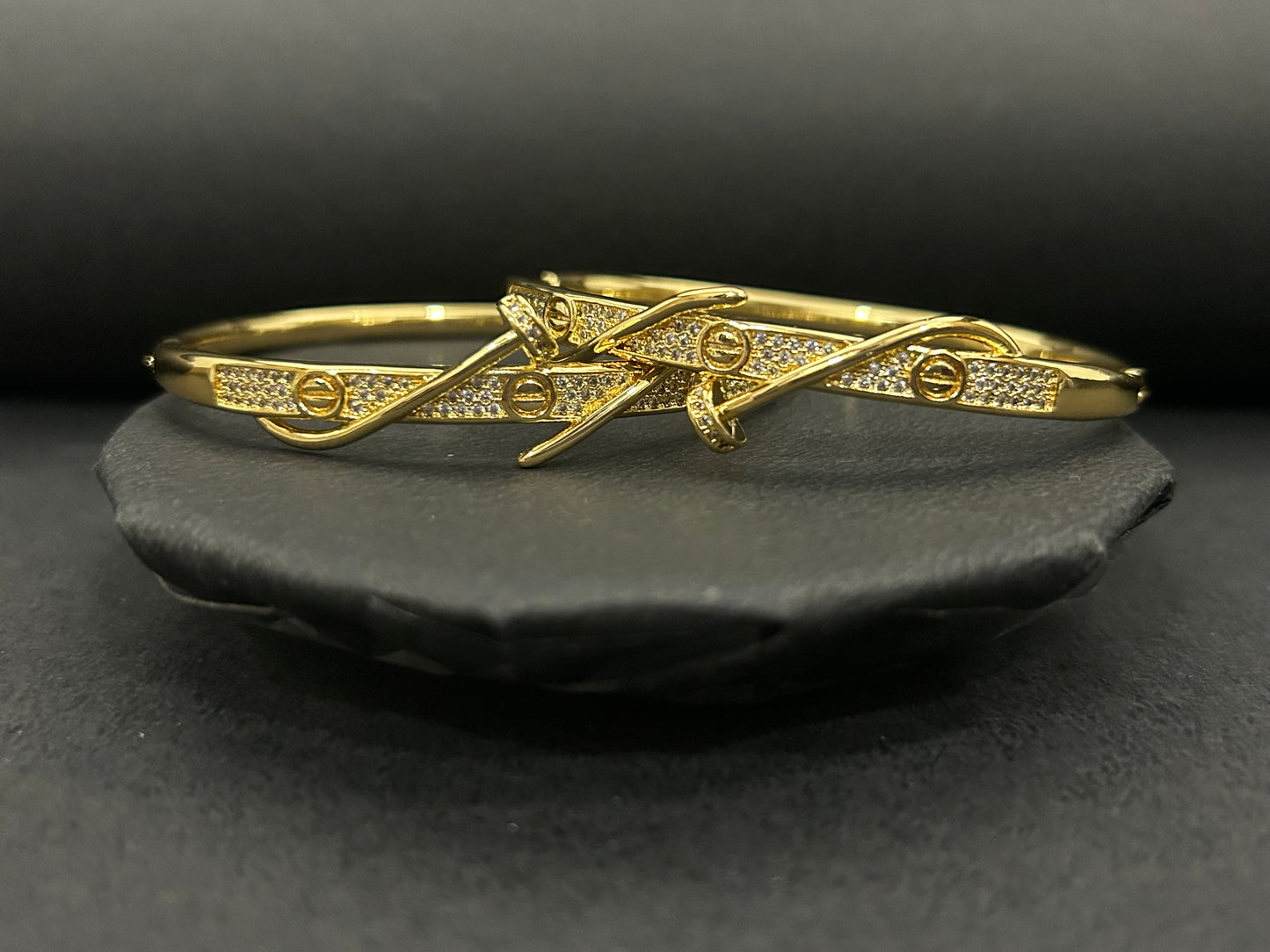 Elegant Crossover Gold Bangles