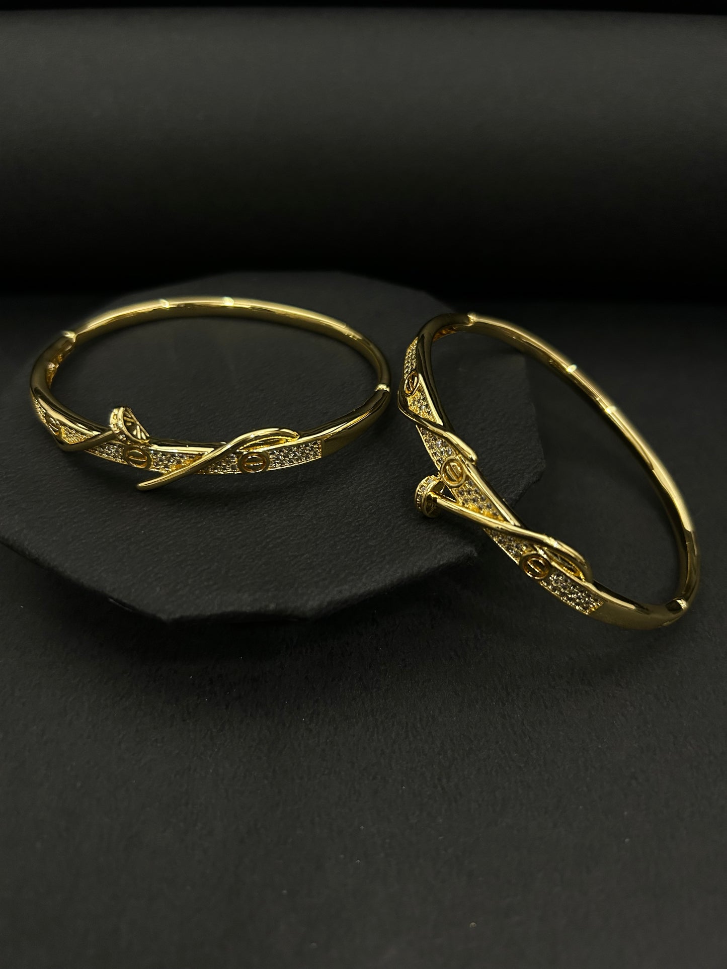 Elegant Crossover Gold Bangles